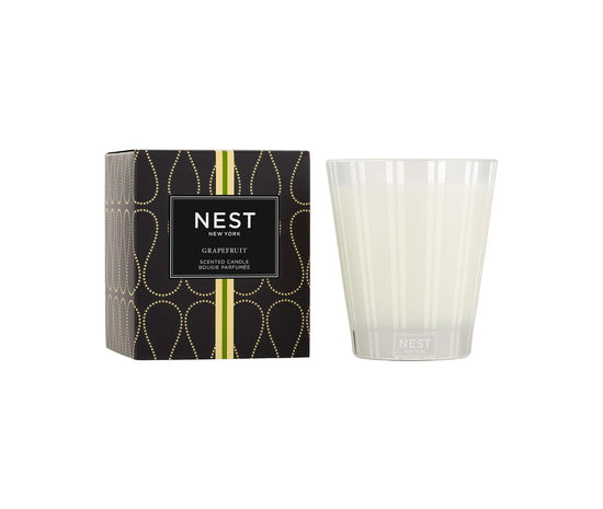 Photo of Grapefruit Candle in a decorative scene, designed by , available at Plumb Gold & Plumb Silver