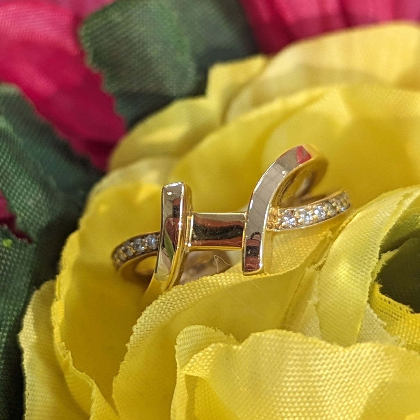 Photo of HL Channel Bypass Ring Mounting in a decorative scene, designed by , available at Plumb Gold & Plumb Silver