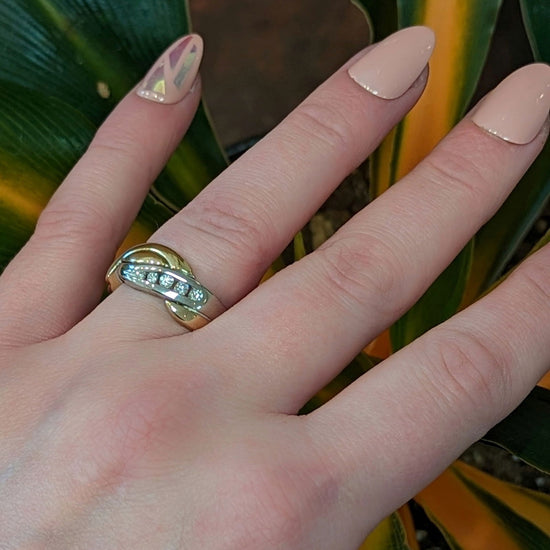 Photo of "Inseparable" Ring in a decorative scene, designed by , available at Plumb Gold & Plumb Silver