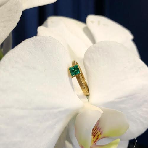 Photo of Kim Collins Emerald Yum Drop in a decorative scene, designed by , available at Plumb Gold & Plumb Silver