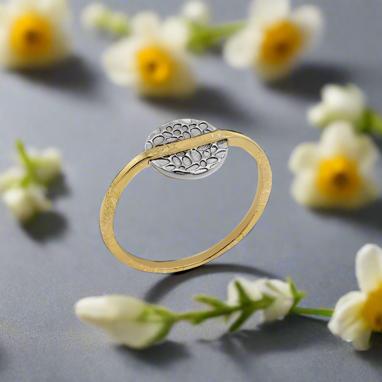 Load image into Gallery viewer, Photo of “Kymbal” Ring in a decorative scene, designed by , available at Plumb Gold &amp;amp; Plumb Silver
