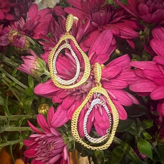 Photo of Lake Multi Tone Earrings in a decorative scene, designed by -, available at Plumb Gold & Plumb Silver