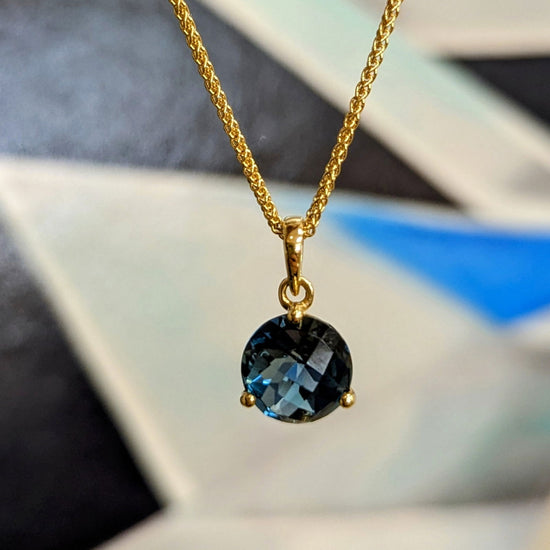 Photo of London Blue Checkerboard Pendant in a decorative scene, designed by , available at Plumb Gold & Plumb Silver