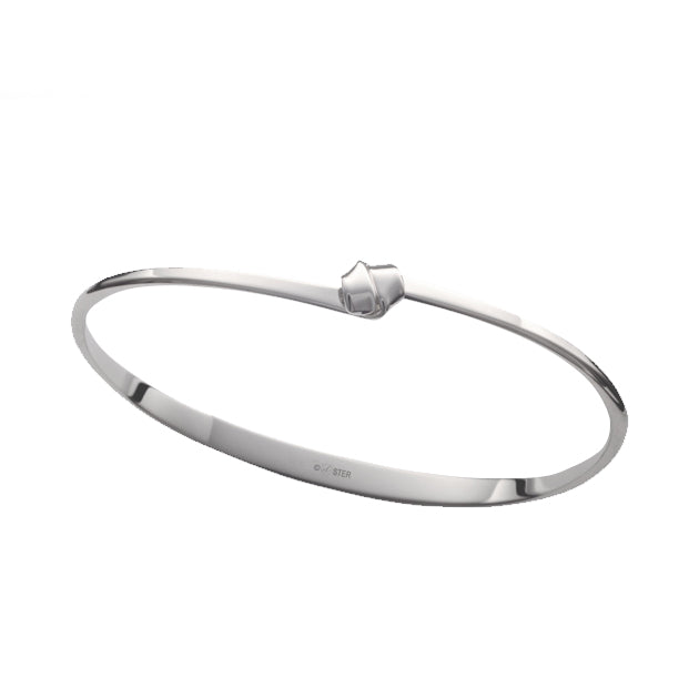 Photo of "Love Knot" Bracelet in a decorative scene, designed by , available at Plumb Gold & Plumb Silver