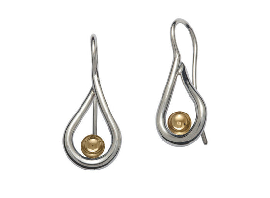 Photo of "Mana" Drop Sterling Silver Gold Ball Earrings in a decorative scene, designed by , available at Plumb Gold & Plumb Silver