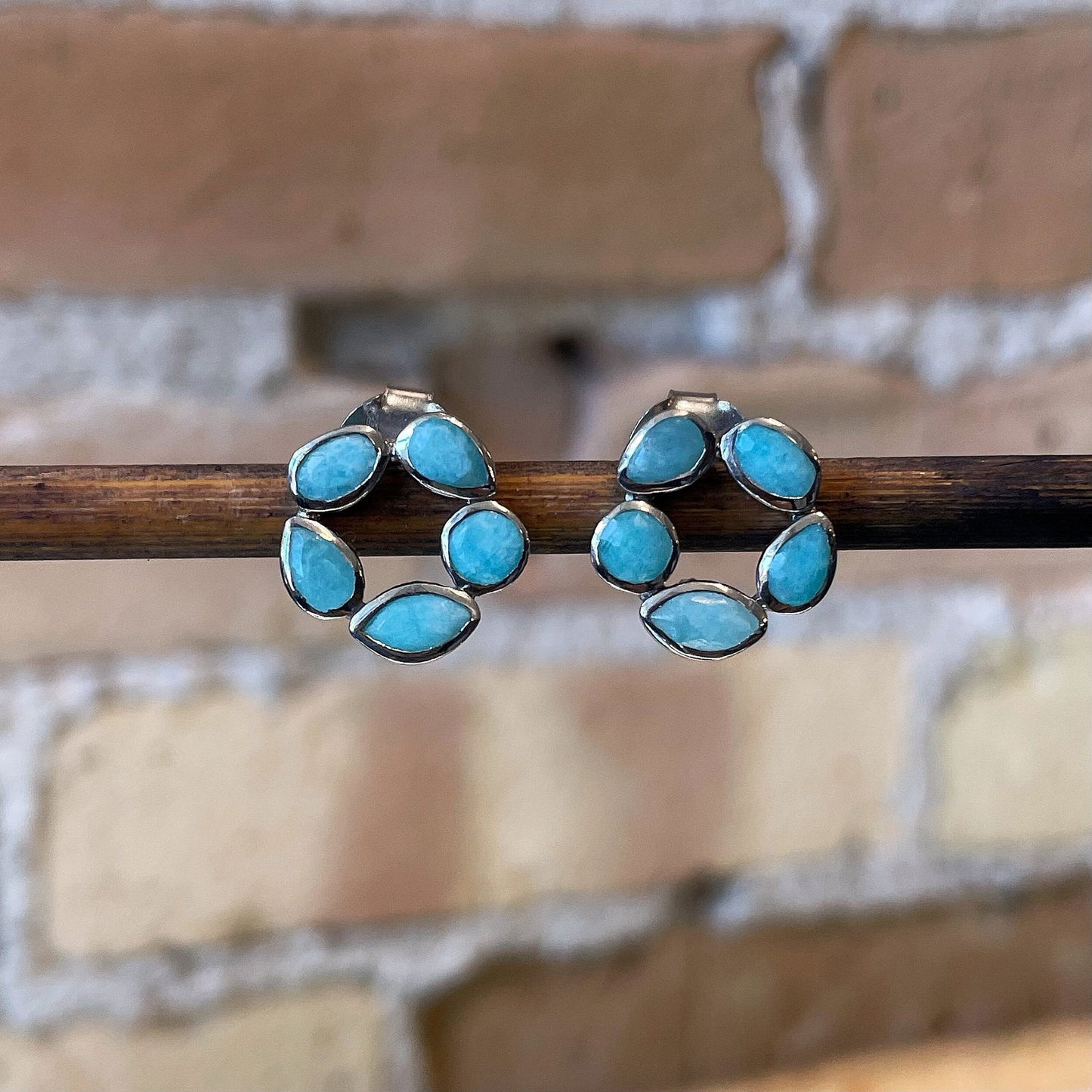 Photo of “Morning” Amazonite Studs in a decorative scene, designed by , available at Plumb Gold & Plumb Silver