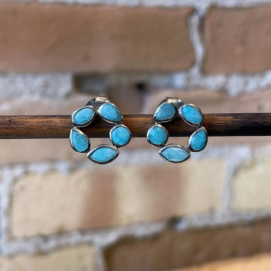 Photo of “Morning” Amazonite Studs in a decorative scene, designed by , available at Plumb Gold & Plumb Silver