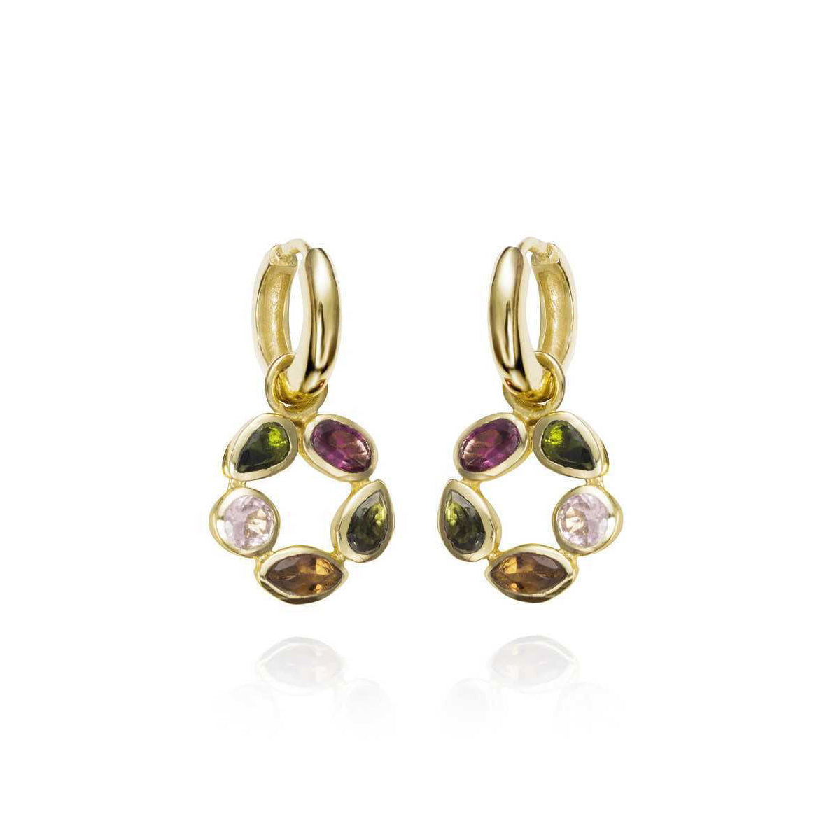 Photo of "Morning" Tourmaline Earrings in a decorative scene, designed by -, available at Plumb Gold & Plumb Silver