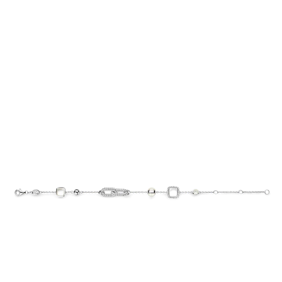 Photo of Mother Of Pearl Geo Station Bracelet in a decorative scene, designed by , available at Plumb Gold & Plumb Silver