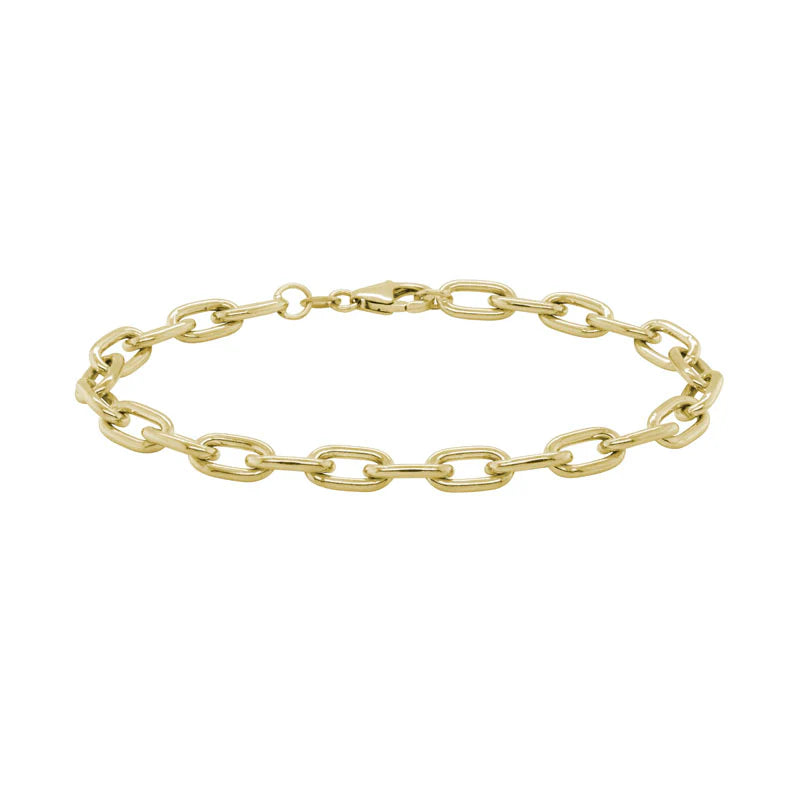Photo of Oval Cable Bracelet in a decorative scene, designed by , available at Plumb Gold & Plumb Silver