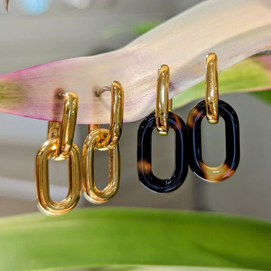 Photo of Oval Hoops or Charms in a decorative scene, designed by , available at Plumb Gold & Plumb Silver