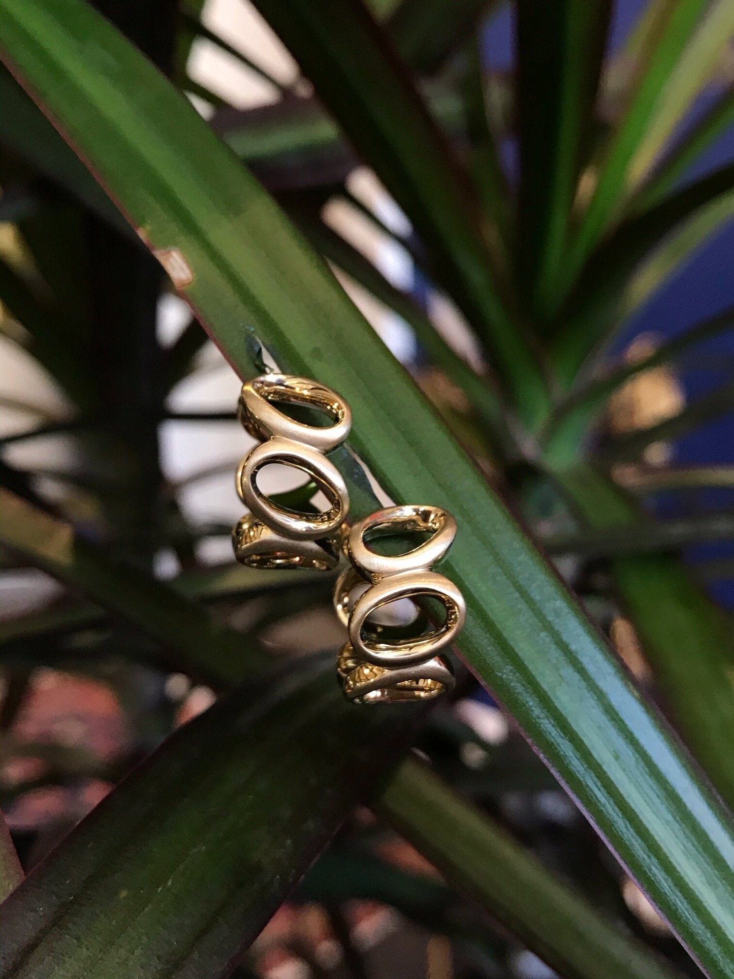 Photo of Ovals Huggies in a decorative scene, designed by , available at Plumb Gold & Plumb Silver