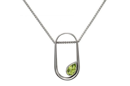 Photo of "Paragon" Pendant in a decorative scene, designed by , available at Plumb Gold & Plumb Silver