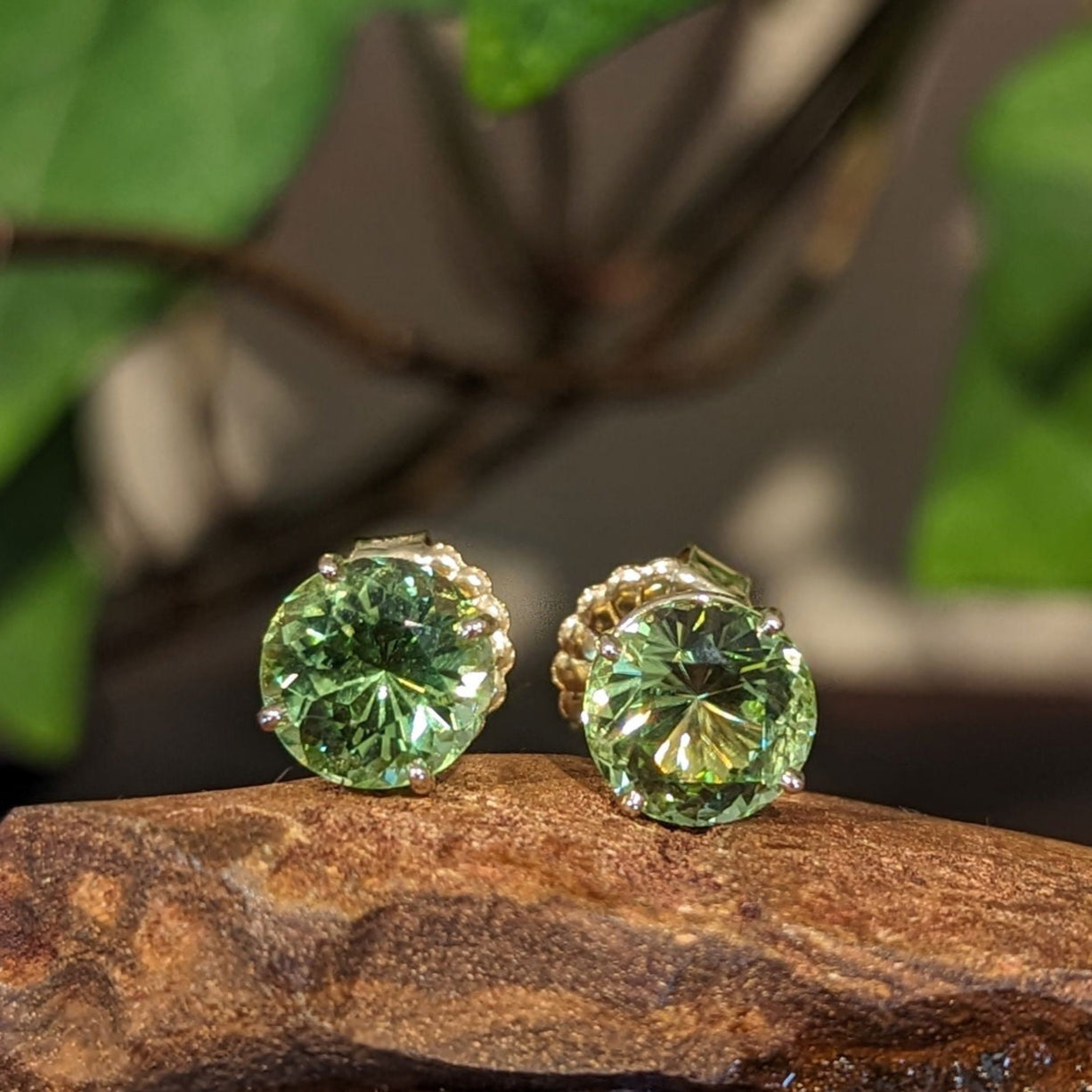 Photo of Peridot Studs in a decorative scene, designed by , available at Plumb Gold & Plumb Silver