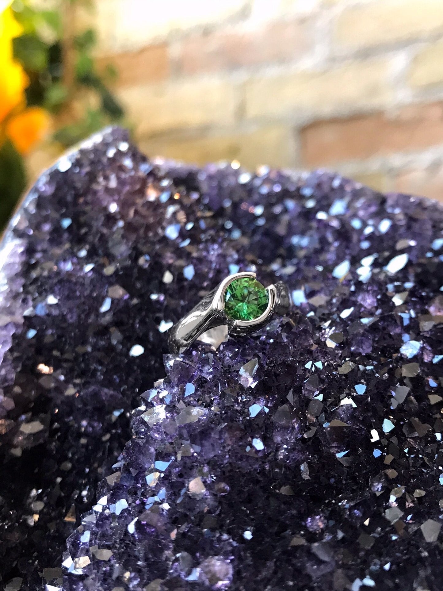 Photo of Plumb Gold Legacy Chrome Tourmaline Ring in a decorative scene, designed by , available at Plumb Gold & Plumb Silver