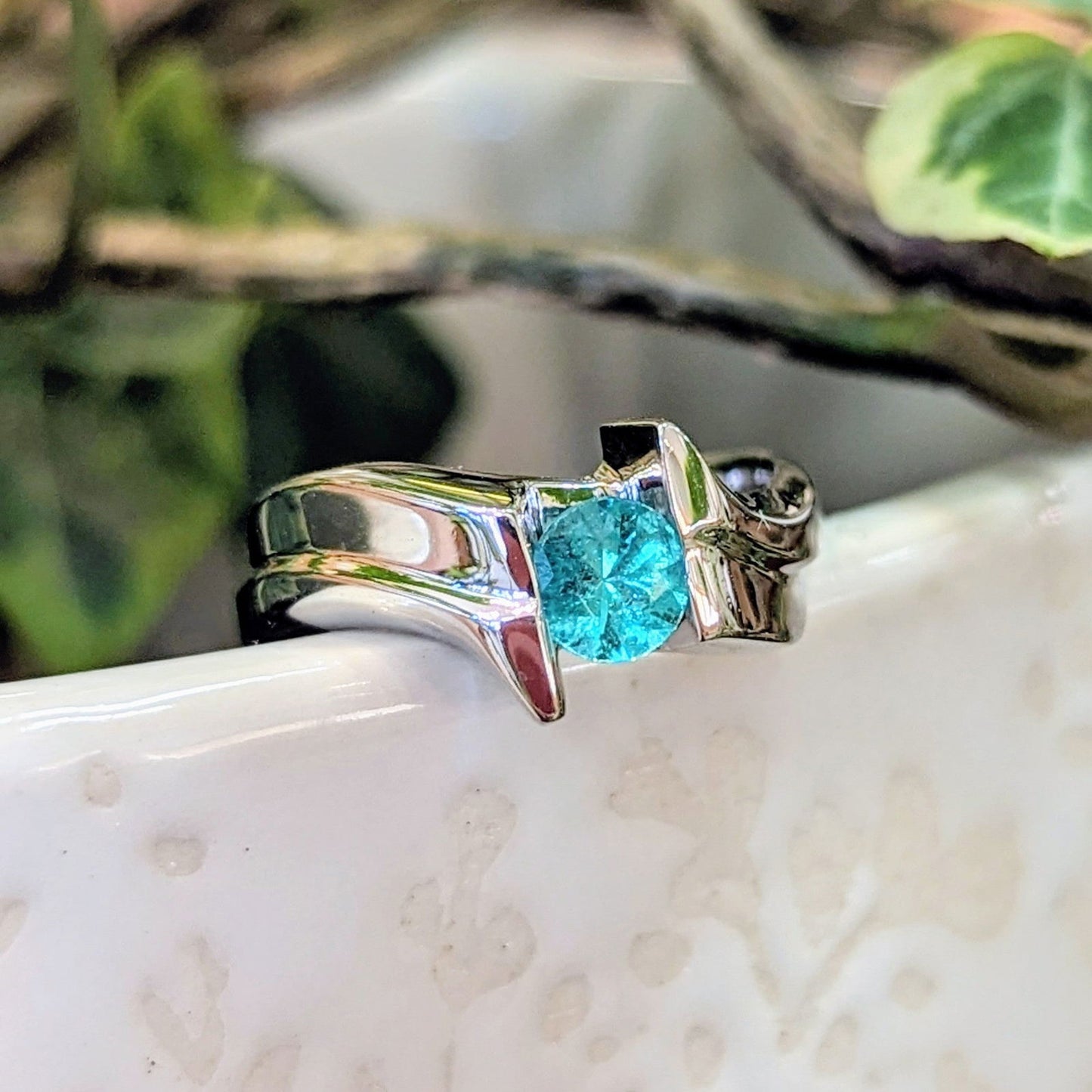 Photo of Plumb Gold Original Emerald Ring in a decorative scene, designed by , available at Plumb Gold & Plumb Silver