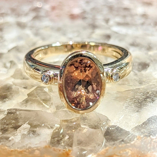 Photo of Precious Topaz Ring in a decorative scene, designed by , available at Plumb Gold & Plumb Silver