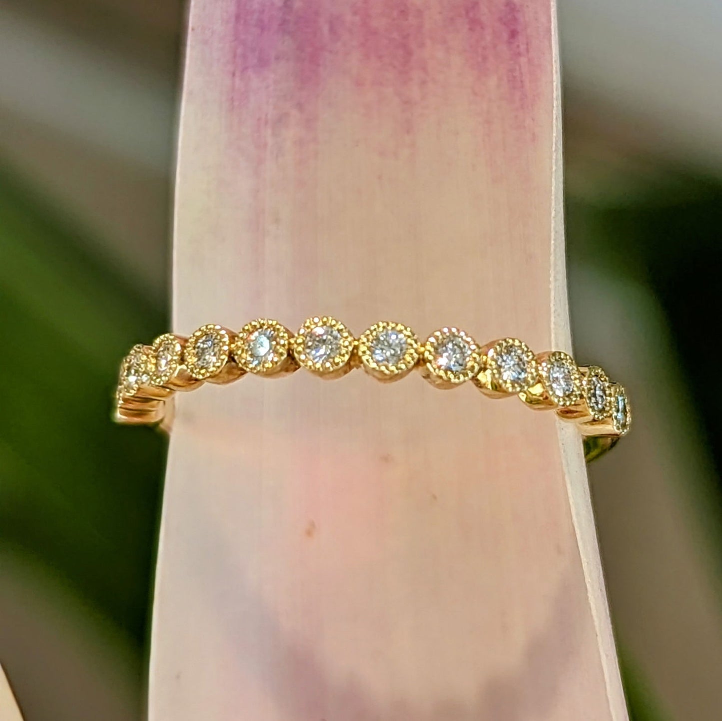 Photo of "Regan" Band in a decorative scene, designed by , available at Plumb Gold & Plumb Silver