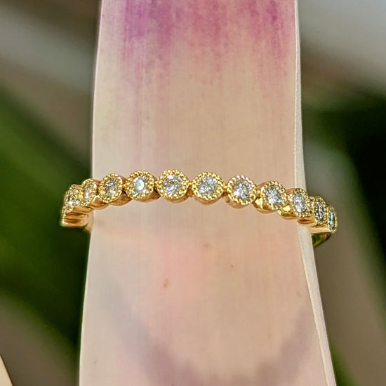 Photo of "Regan" Band in a decorative scene, designed by , available at Plumb Gold & Plumb Silver