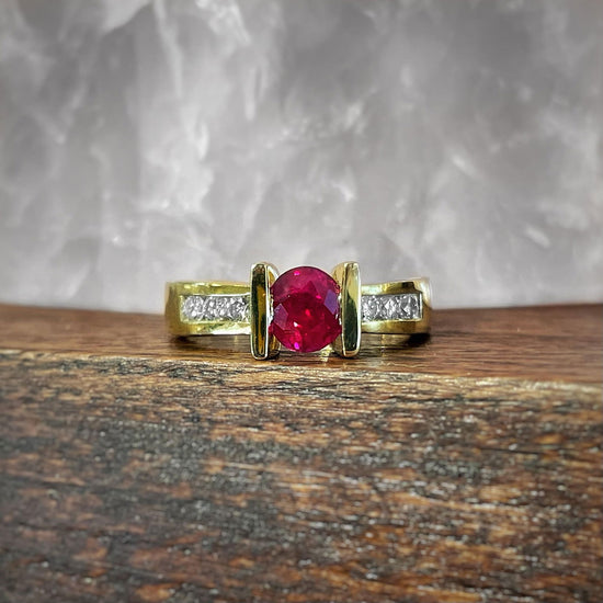 Photo of Ruby and Diamond Ring in a decorative scene, designed by , available at Plumb Gold & Plumb Silver