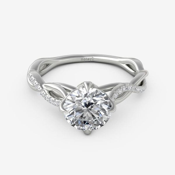 Photo of "Selena" Engagement Ring in a decorative scene, designed by , available at Plumb Gold & Plumb Silver