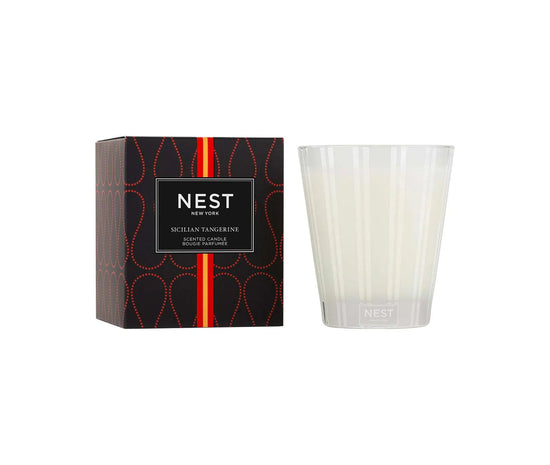 Photo of Sicilian Tangerine Classic Candle in a decorative scene, designed by , available at Plumb Gold & Plumb Silver
