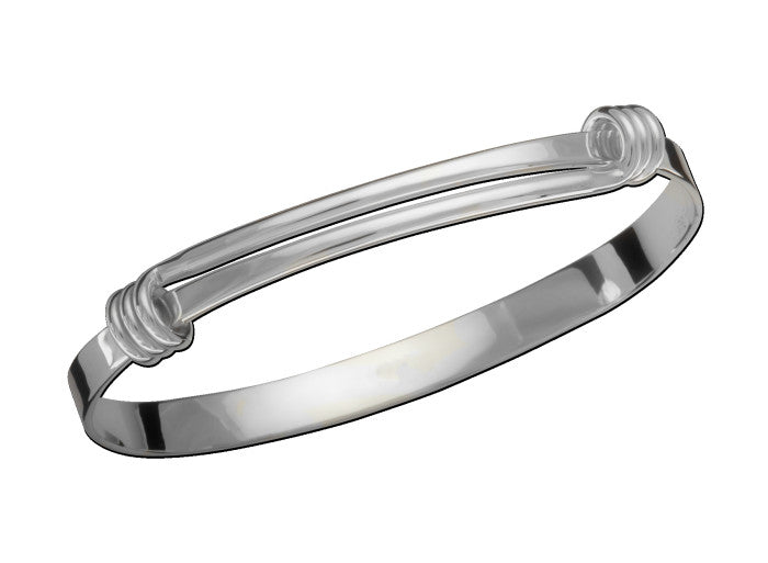 Photo of "Signature" Bracelet in a decorative scene, designed by , available at Plumb Gold & Plumb Silver