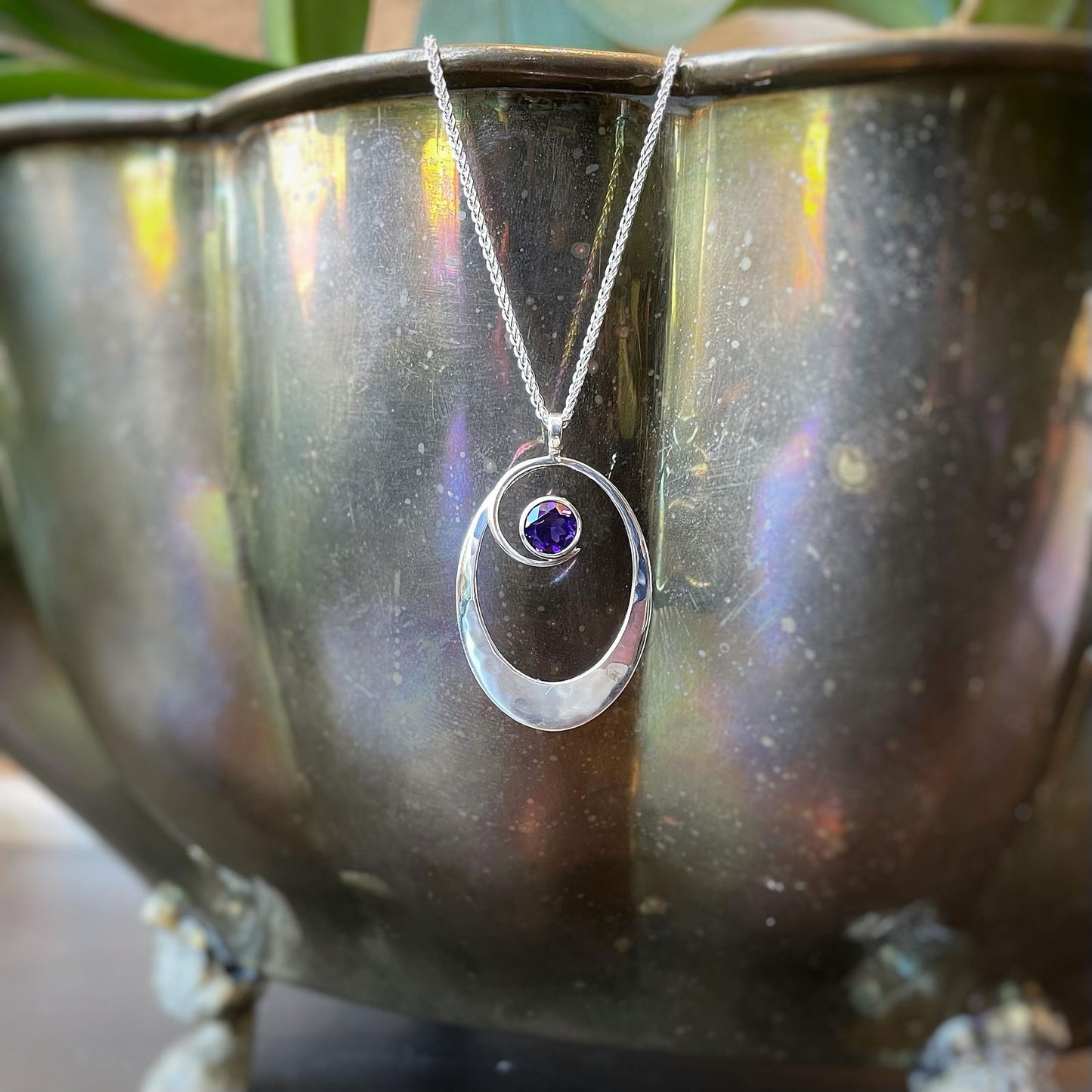 Photo of "Sophia" Necklace in a decorative scene, designed by , available at Plumb Gold & Plumb Silver