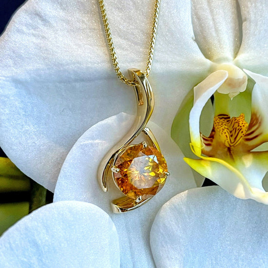 Photo of Sphalerite Pendant in a decorative scene, designed by , available at Plumb Gold & Plumb Silver