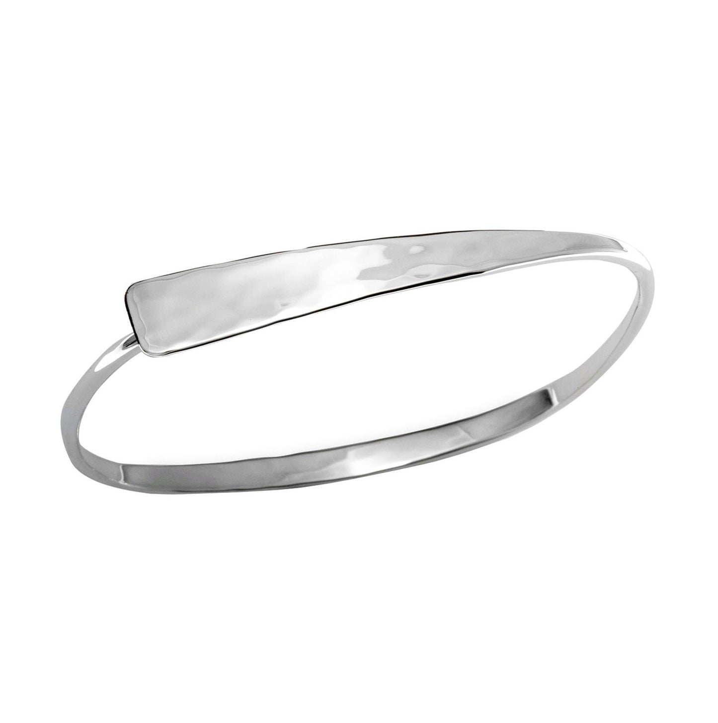 Photo of "Squircle Flip" Bracelet in a decorative scene, designed by , available at Plumb Gold & Plumb Silver