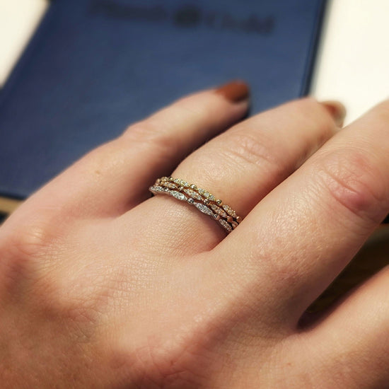 Photo of Stackable Rings in a decorative scene, designed by , available at Plumb Gold & Plumb Silver