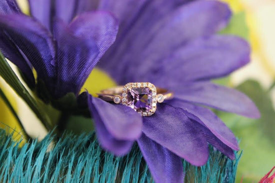 Photo of Stanton Color Rose de France Amethyst Ring in a decorative scene, designed by , available at Plumb Gold & Plumb Silver