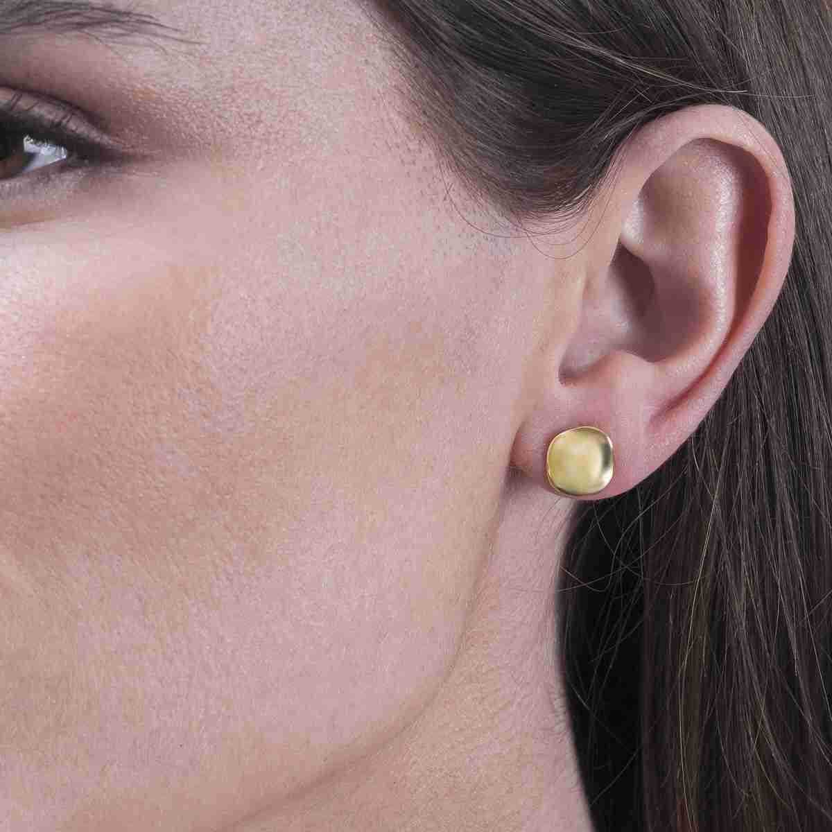 Photo of The "Aqua" Studs in a decorative scene, designed by -, available at Plumb Gold & Plumb Silver