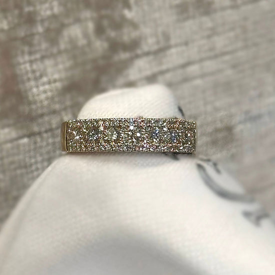 Photo of The "Jeanie" Anniversary Band in a decorative scene, designed by , available at Plumb Gold & Plumb Silver