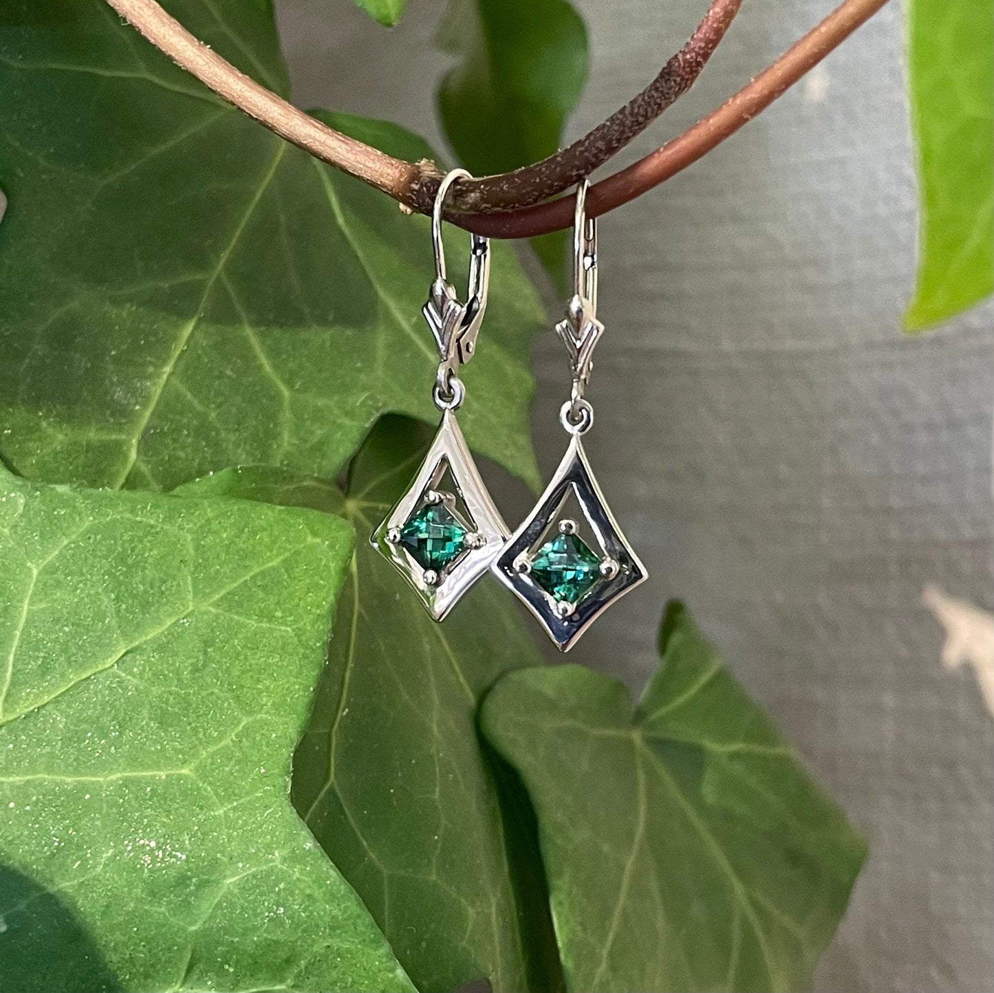 Photo of Tourmaline Dangles in a decorative scene, designed by , available at Plumb Gold & Plumb Silver