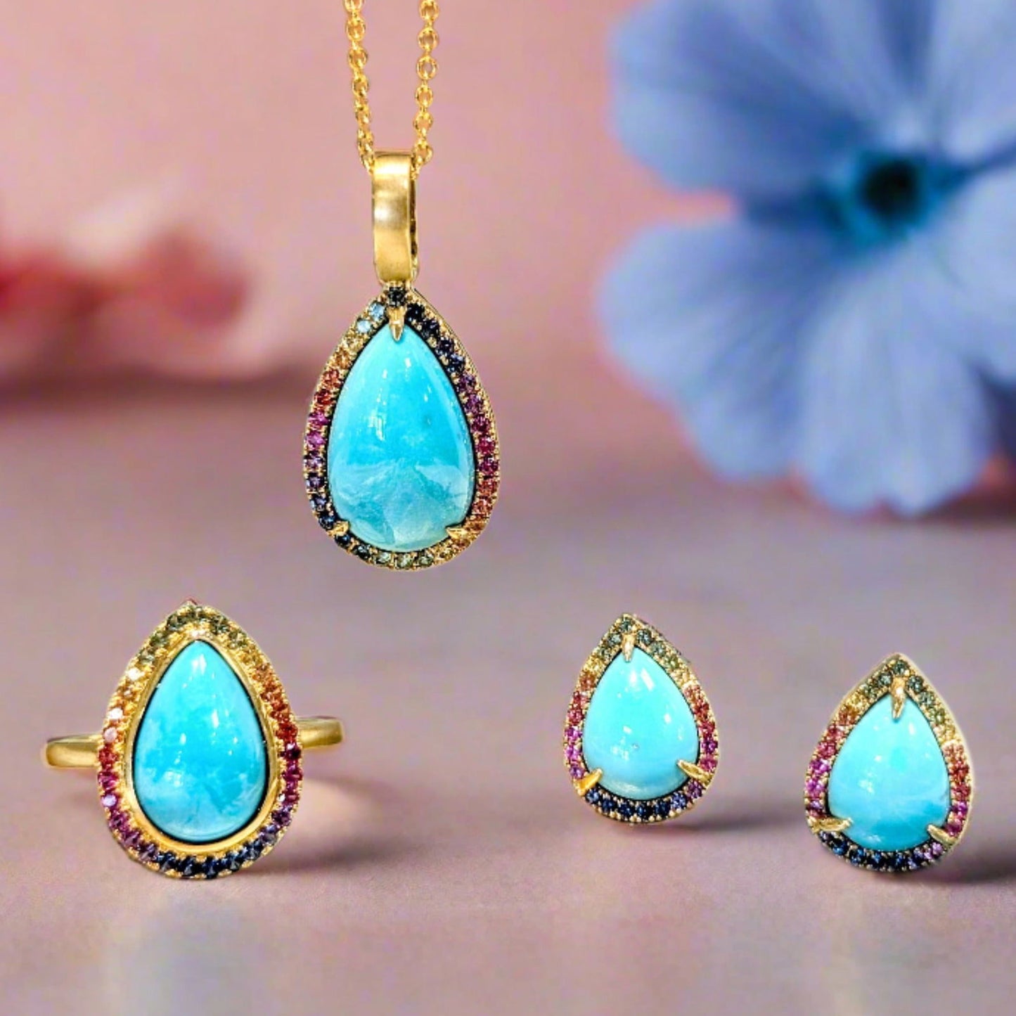 Photo of Turquoise and Rainbow Sapphire Studs in a decorative scene, designed by , available at Plumb Gold & Plumb Silver