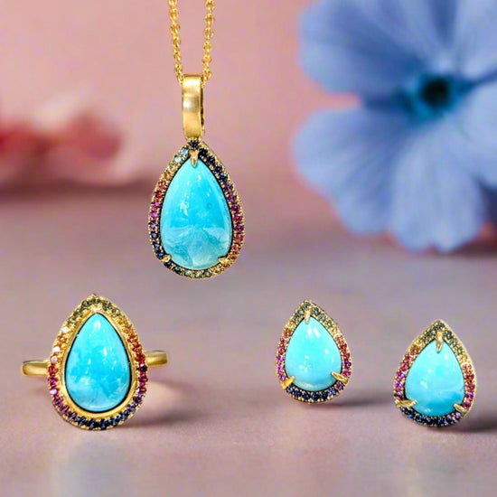 Photo of Turquoise and Rainbow Sapphire Studs in a decorative scene, designed by , available at Plumb Gold & Plumb Silver