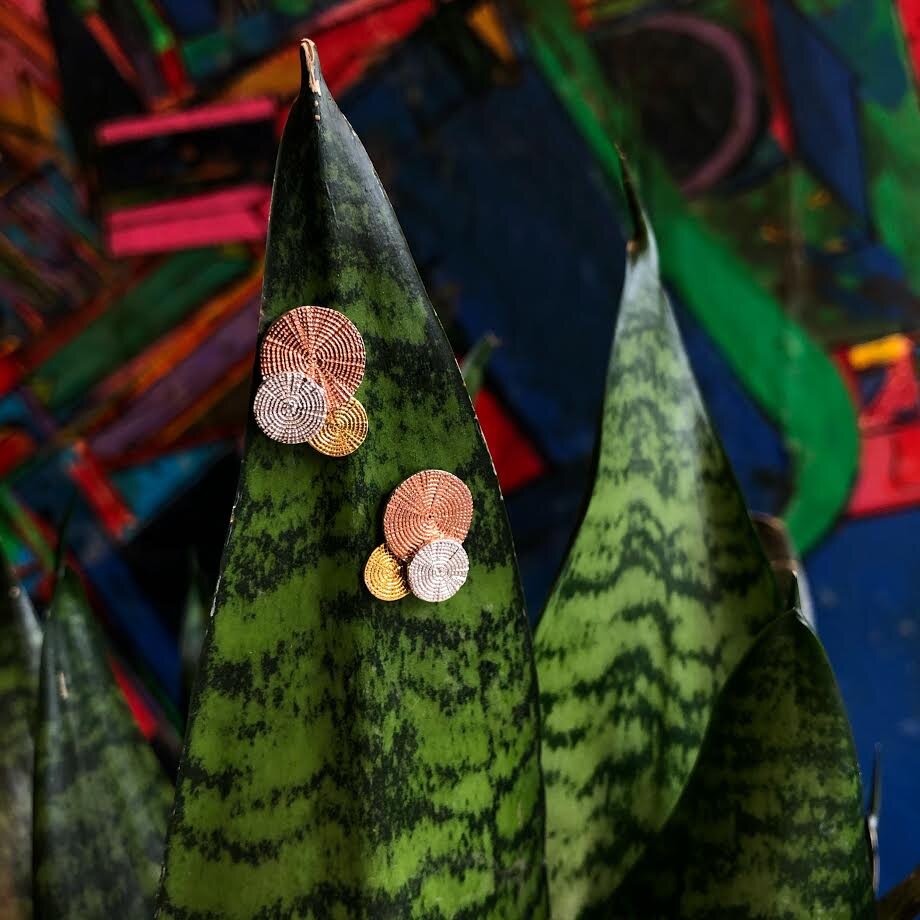 Photo of Twilight Stud Earrings in a decorative scene, designed by , available at Plumb Gold & Plumb Silver