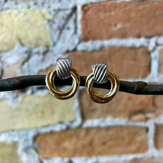 Photo of Two-tone Twisted Rope Studs in a decorative scene, designed by , available at Plumb Gold & Plumb Silver