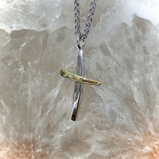 Photo of Two Toned Swept Cross in a decorative scene, designed by , available at Plumb Gold & Plumb Silver