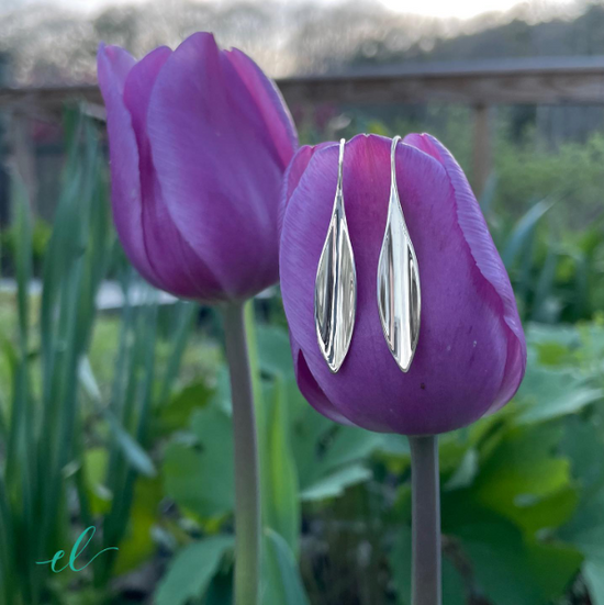 Photo of "Willow" Earrings in a decorative scene, designed by , available at Plumb Gold & Plumb Silver