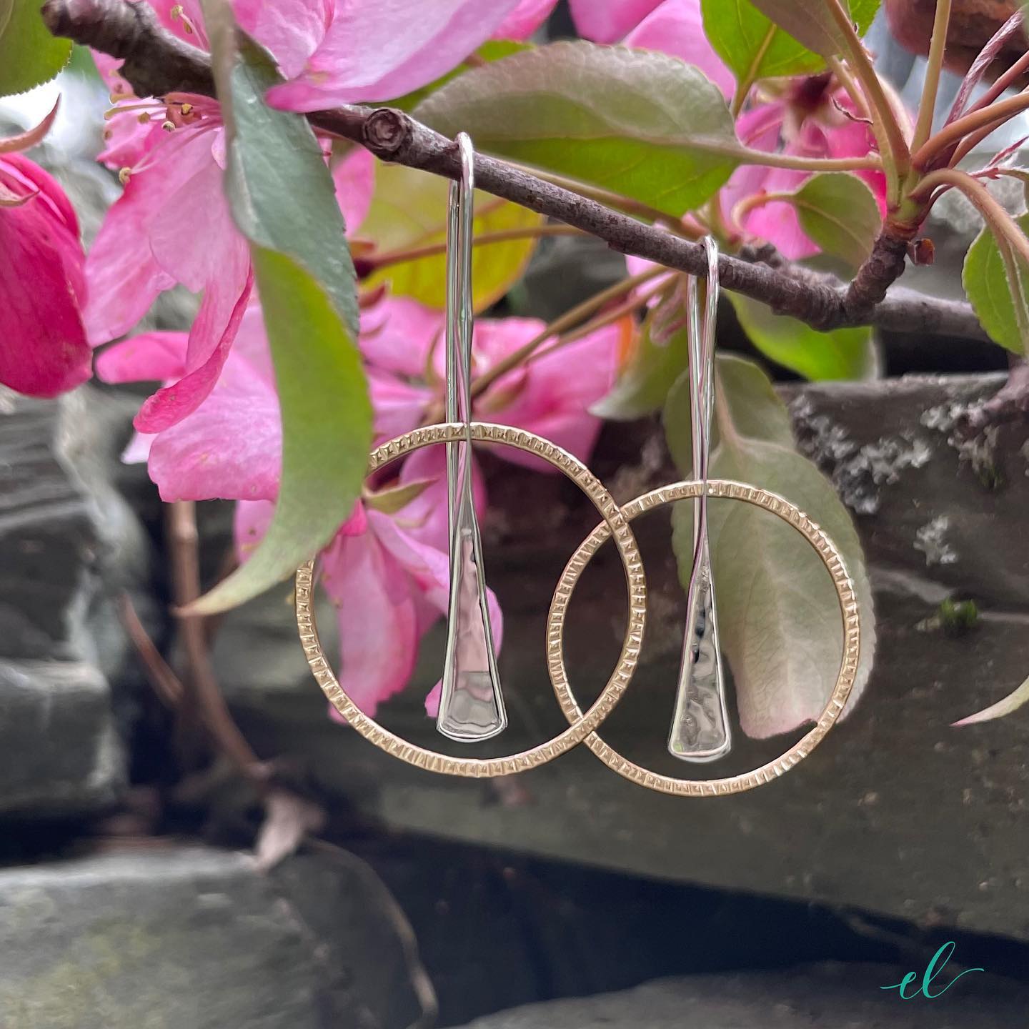 Photo of "Wishful" Earrings in a decorative scene, designed by , available at Plumb Gold & Plumb Silver