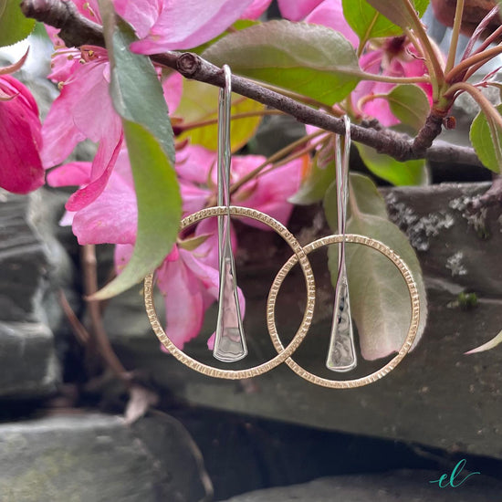 Photo of "Wishful" Earrings in a decorative scene, designed by , available at Plumb Gold & Plumb Silver