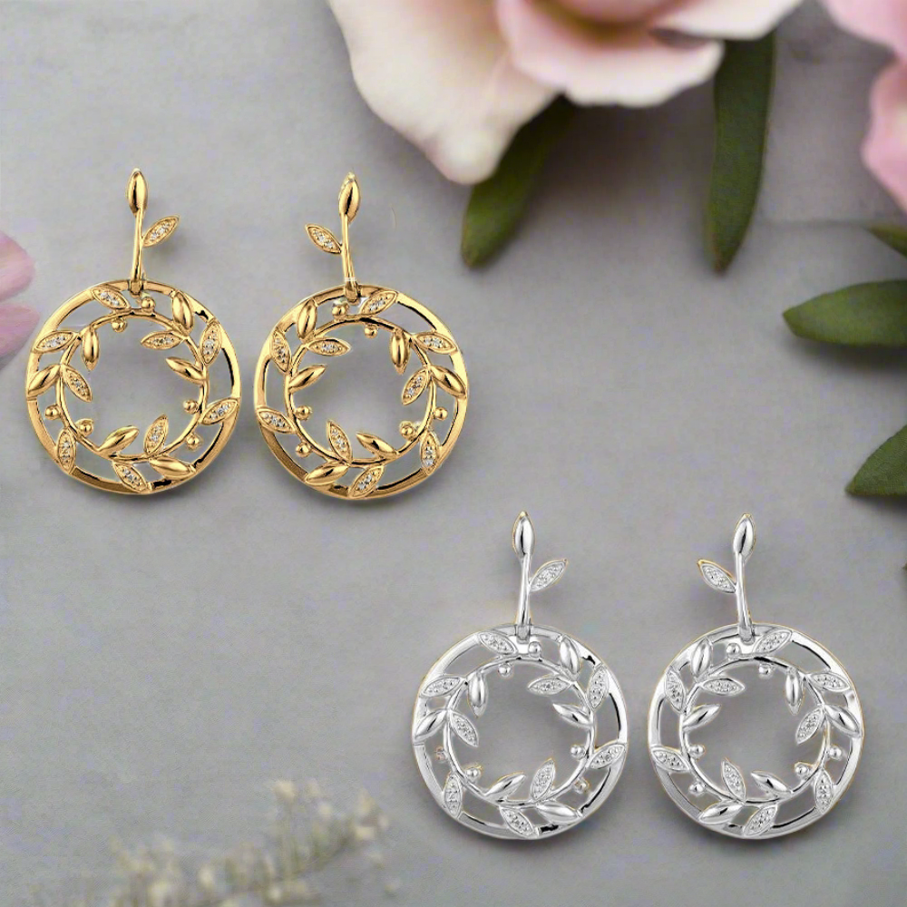 Photo of Wreath Earrings in a decorative scene, designed by , available at Plumb Gold & Plumb Silver