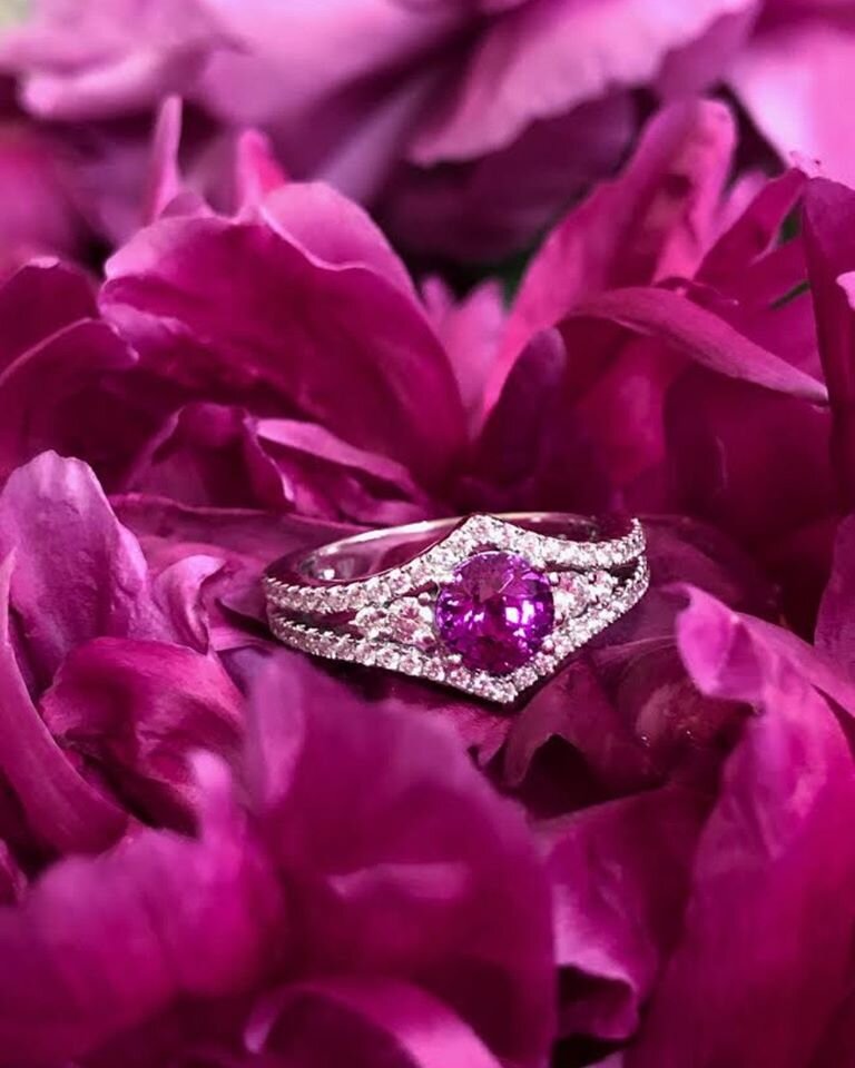 Photo of Zoma Color Pink Sapphire Ring in a decorative scene, designed by , available at Plumb Gold & Plumb Silver