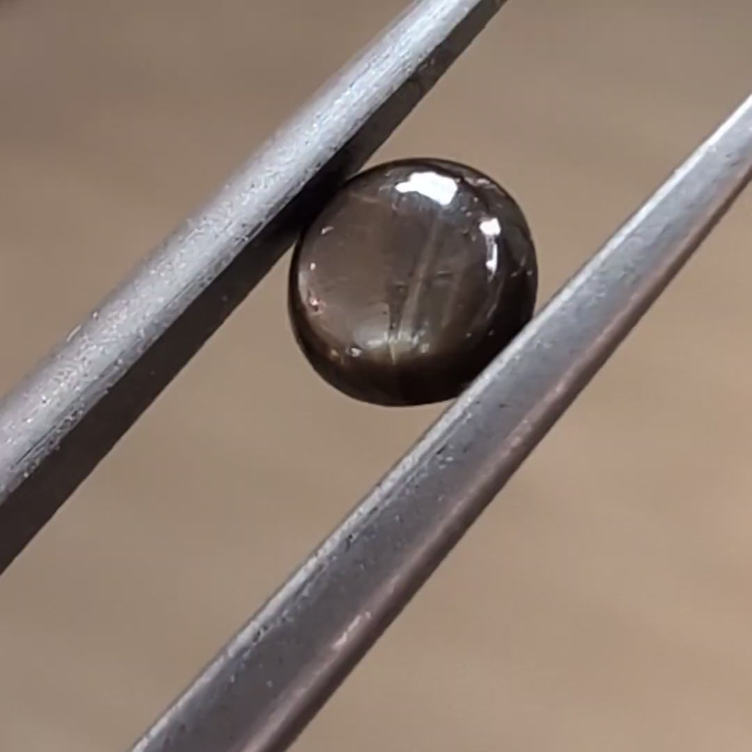 Load and play video in Gallery viewer, Black &amp;#39;Star&amp;#39; Sapphire, 0.34cts
