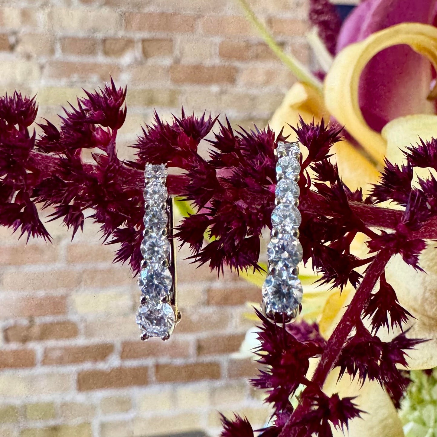 Graduated CZ Oval Huggie Hoop